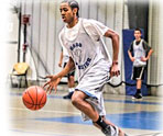 Mass Premier Basketball Player Dribbling the Ball