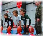 Mass Premier Children Learning how to Kick Footballs